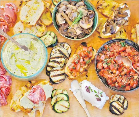  ??  ?? Bruschetta toppings needn’t be confined to diced tomatoes. The recipes below include prosciutto, mushroom, salami and grilled vegetables.
