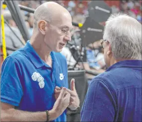  ?? Michael Blackshire Las Vegas Review-journal ?? NBA commission­er Adam Silver, left, talks to Warren Legarie, Vegas Summer League executive director, on Sunday at the Thomas & Mack Center.