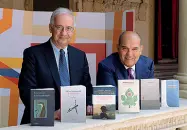  ?? ?? Pagine
Walter Veltroni , con Enrico Carraro, presidente di Confindust­ria Veneto