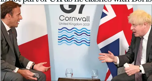  ??  ?? ROW: President Macron and Boris Johnson in heated discussion at the G7 summit in Cornwall yesterday