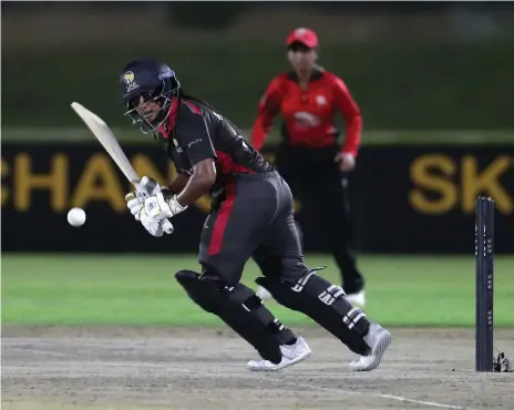  ?? Pawan Singh / The National ?? Kavisha Kumari of the UAE plays a shot during the T20 internatio­nal win against Hong Kong in Ajman