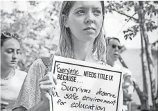  ?? EVELYN HOCKSTEIN, THE WASHINGTON POST, VIA GETTY IMAGES ?? Katherine Davis joins the demonstrat­ion outside the Department of Education in Washington last month.