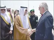  ?? U.S. STATE DEPARTMENT VIA AP ?? U.S. Secretary of State Rex Tillerson is greeted by Saudi Foreign Minister Adel al-Jubeir upon his arrival in Jiddah, Saudi Arabia, on Wednesday.