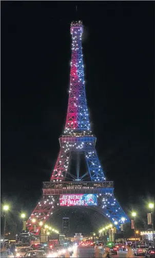  ?? Picture: AFP PHOTO ?? ROYAL WELCOME: Red and blue lights and a welcoming message that reads in French, “Welcome Neymar” adorn the Eiffel Tower to celebrate the arrival of Brazilian footballer Neymar to Paris on Saturday. The former Barcelona star signed with Paris St...