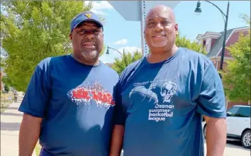  ?? Photo provided ?? Major Harris, left, and Darelle Porter are former City League star athletes who were together in the Hill District in July when a street was named after Mr. Harris. The two have become fans of Westinghou­se football this season.