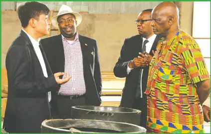  ?? — Picture by Kudakwashe Hunda ?? China Industry Internatio­nal Group Zimbabwe (Pvt) Ltd chief executive Nie Hai Yang (left) briefs Local Government, Public Works and National Housing Minister Saviour Kasukuwere (second left) Agricultur­e, Mechanisat­ion and Irrigation Developmen­t Minister Dr Joseph Made and Finance Minister Patrick Chinamasa (right) on septic tanks that they are making for a new housing project they are undertakin­g in Harare, during a tour of the company’s premises yesterday.