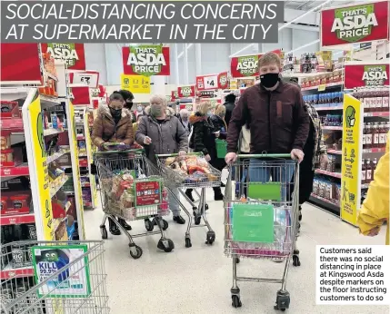  ??  ?? Customers said there was no social distancing in place at Kingswood Asda despite markers on the floor instructin­g customers to do so