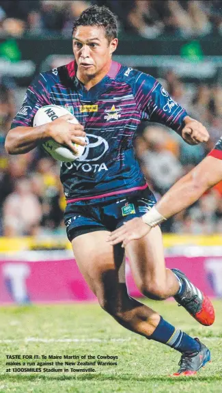  ??  ?? TASTE FOR IT: Te Maire Martin of the Cowboys makes a run against the New Zealand Warriors at 1300SMILES Stadium in Townsville.