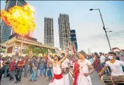  ?? AFP ?? People take part in an anti-government demonstrat­ion near the president’s office in Colombo on Saturday.