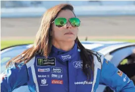  ?? TERRY RENNA/AP ?? Danica Patrick is seen on pit road after a qualifying run for the Daytona 500 on Sunday at Daytona Internatio­nal Speedway.