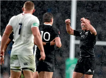  ??  ?? All Blacks midfielder Ryan Crotty celebrates the narrowest of victories over England at Twickenham.