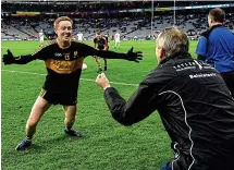  ??  ?? LOCAL
HERO: Dr Crokes star Colm Cooper celebrates with Pat O’Shea