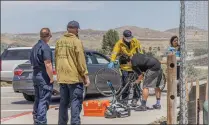  ?? Bobby Block/The Signal ?? First responders respond to the scene of a traffic collision between a car and a bicycle May 10. Deputies are planning for a bicycle and pedestrian safety operation Wednesday.