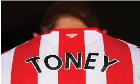  ?? ?? A Brentford fan with Ivan Toney’s name on the back. Photograph: Alex Pantling/Getty Images
