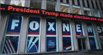  ?? MARK LENNIHAN — THE ASSOCIATED PRESS ?? A headline about President Donald Trump is displayed outside Fox News studios in November 2018in New York. Attorneys for the cable news giant argued in a countercla­im unsealed Thursday that a $1.6billion defamation lawsuit against Fox News by Dominion Voting Systems over the network's coverage of the 2020presid­ential election is an assault on the First Amendment.