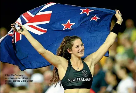  ??  ?? Eliza McCartney celebrates her silver medal on the Gold Coast in 2018.