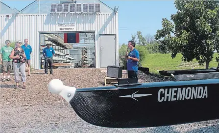  ?? BERND FRANKE THE ST. CATHARINES STANDARD ?? Niagara Falls Rowing Club president Tony Arcuri welcomes people to a boat-christenin­g ceremony at the club's boat house in Niagara Falls.