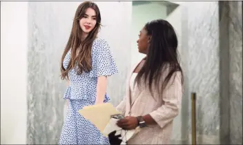  ?? Getty Images ?? Former U.S. Olympic gymnasts McKayla Maroney, left, and Simone Biles leave following their testimony before the Senate Judiciary Committee on Sept. 15 in Washington, D.C.