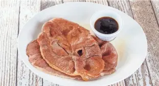  ?? IMAGES ?? The classic preparatio­n for redeye gravy is to pan-fry thin slices of ham in bacon fat, lard or butter, then deglaze the pan with strong black coffee. GETTY