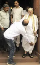  ?? — PRITAM BANDYOPADH­YAY ?? A visitor ( clockwise from above) seeks blessings of veteran BJP leader Murli Manohar Joshi at Parliament House; TMC MP Derek O’Brien is seen in a relaxed mood; suspended BJP MP Kirti Azad shares a light moment with CPI ( M) general secretary Sitaram Yechury at the Parliament House in New Delhi on Thursday.