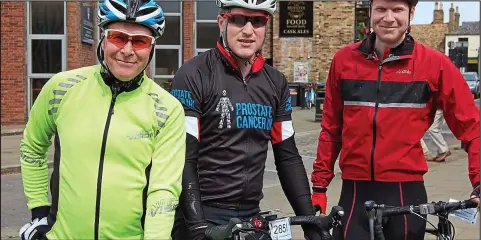  ??  ?? On their bikes: Stephen Biddle, with his sons David and Alexander, taking part in a charity cycle ride