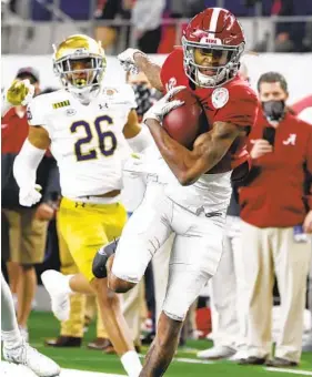  ?? MICHAEL AINSWORTH AP ?? Alabama senior DeVonta Smith, who has 105 catches for 1,641 yards and 20 touchdowns this season, would become the fourth wide receiver to win the Heisman.