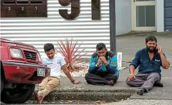  ??  ?? Anguish: Grieving members of the public following murders at Al Noor mosque