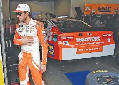  ?? THE ASSOCIATED PRESS PHOTOS ?? Chase Elliott leaves the garage after practice Thursday at Daytona Internatio­nal Speedway in Daytona Beach, Fla. The 22-year-old Dawsonvill­e, Ga., native is among the young drivers who were expected to boost NASCAR, but the 2016 rookie of the year has yet to win a Cup Series race.