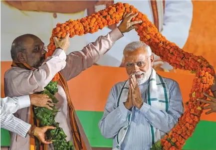  ?? Photo: AFP ?? Indian Prime Minister Narendra Modi during BJP celebratio­ns in Delhi after the Karnataka election in May this year.