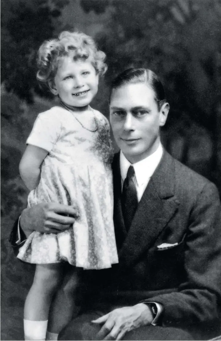  ?? ?? A smiling Princess Elizabeth in 1930 with her father, who became King George VI