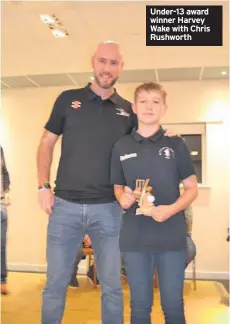  ??  ?? Under-13 award winner Harvey Wake with Chris Rushworth