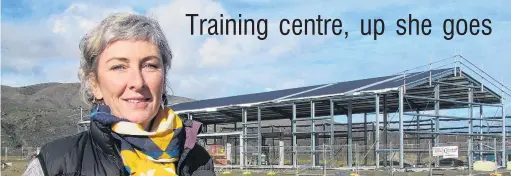  ?? PHOTO: PAM JONES ?? Framework . . . Otago Polytechni­c Central Campus marketing and business developmen­t manager Melanie Kees looks over the beginnings of the polytechni­c’s new trades training facility at its Bannockbur­n Rd site.