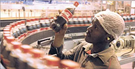  ?? PHOTO: BLOOMBERG ?? A Coca-Cola bottling plant in Olifantsfo­ntein, Joburg. Africa is experienci­ng the most rapid urbanisati­on rate in the world and, by 2034, it is expected to boast a larger working-age population than China or India, the author says.