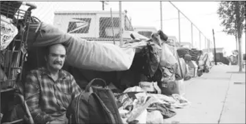  ?? ?? A resident of a homeless encampment in San Pedro from several years ago. File photo