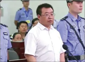  ?? CHANGSHA INTERMEDIA­TE PEOPLE’S COURT/AFP ?? This handout file video frame grab taken and released by Changsha Intermedia­te People’s Court on August 22 shows Chinese rights lawyer Jiang Tianyong appearing in court in Changsha in Hunan province.