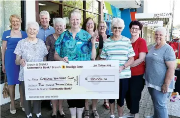  ??  ?? At a presnetati­on of funds are back row (from left): WGHG chairman Christine Holland, healthcare chief executive Dan Weeks, Carol Mallows, Cathy Digby, Jill Hensen, Donna Kent. Front row (from left): Joy Baxter, Kerry Nicholls, Mary Aitken and Vonnie Roberts.