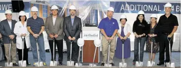  ?? Houston Methodist Sugar Land ?? The Houston Methodist Sugar Land team breaks ground on a six-story patient tower. They are Sean Sevy, left, director of facilities and security; Sally Shen, director of nursing; Scott Stover, director of the Emergency Department; Luis Garcia, director...