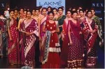 ?? — SHRIPAD NAIK ?? Models walk the ramp for designer Gaurang during Lakme Fashion Week in Mumbai on Friday.