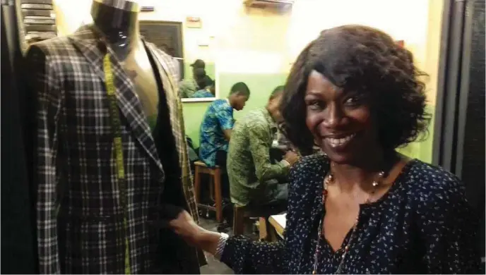  ??  ?? The CEO of Clothing 360, Grace Akinkugbe (right) at a garment factory in Aba