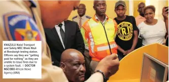  ?? DOCTOR NGCOBO African News Agency (ANA) ?? KWAZULU Natal Transport and Safety MEC Bheki Ntuli at Rossburgh testing station. Officers say they are “getting paid for nothing” as they are unable to issue fines due to a system fault. |