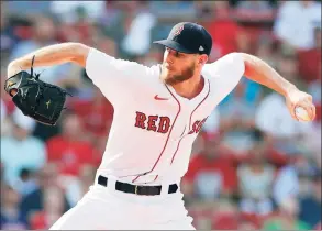  ?? Michael Dwyer / Associated Press ?? The Red Sox’s Chris Sale pitches during the first inning against the Orioles on Saturday in Boston.
The Red Sox’s Rafael Devers runs on his three-run home run during the first inning against the Orioles on Saturday in Boston.