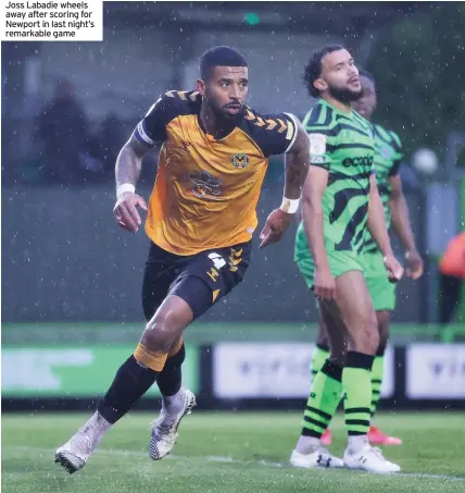  ??  ?? Joss Labadie wheels away after scoring for Newport in last night’s remarkable game