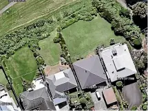  ??  ?? The encroachme­nts are visible in aerial shots viewable on Taranaki Regional Council property informatio­n maps.