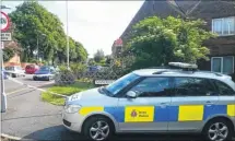  ??  ?? Police at the junction of Mandeville Road and Forty Acres Road