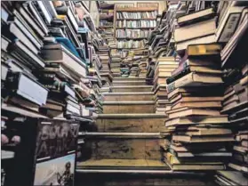  ??  ?? Endless tales: Collectors Treasury in Maboneng, Johannesbu­rg, (left) has more than two million books. Photo: Anthony Schultz