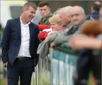  ??  ?? Stephen Kenny chast to fans before kick-off.