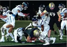  ?? TIM GODBEE / For the Calhoun Times ?? Calhoun’s Baylon Spector (4) plunges into the end zone for a touchdown in the third quarter on Friday.