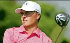  ?? PETER MORRISON/AP PHOTO ?? Jordan Spieth follow his tee shot from the second hole during round three of the British Open from Royal Birkdale in Southport, England on Saturday. Spieth leads by three shots heading into the final round.