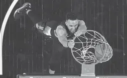  ?? PATRICK BREEN/THE REPUBLIC ?? The Suns' Landry Shamet dunks against the Pelicans in Game 2 of their first-round playoff series in Phoenix on Tuesday night.