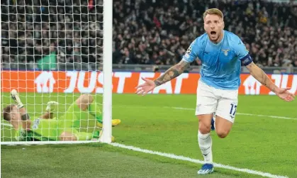  ?? ?? Lazio’s Ciro Immobile celebrates after scoring his first goal against Celtic. Photograph: Alessandra Tarantino/AP